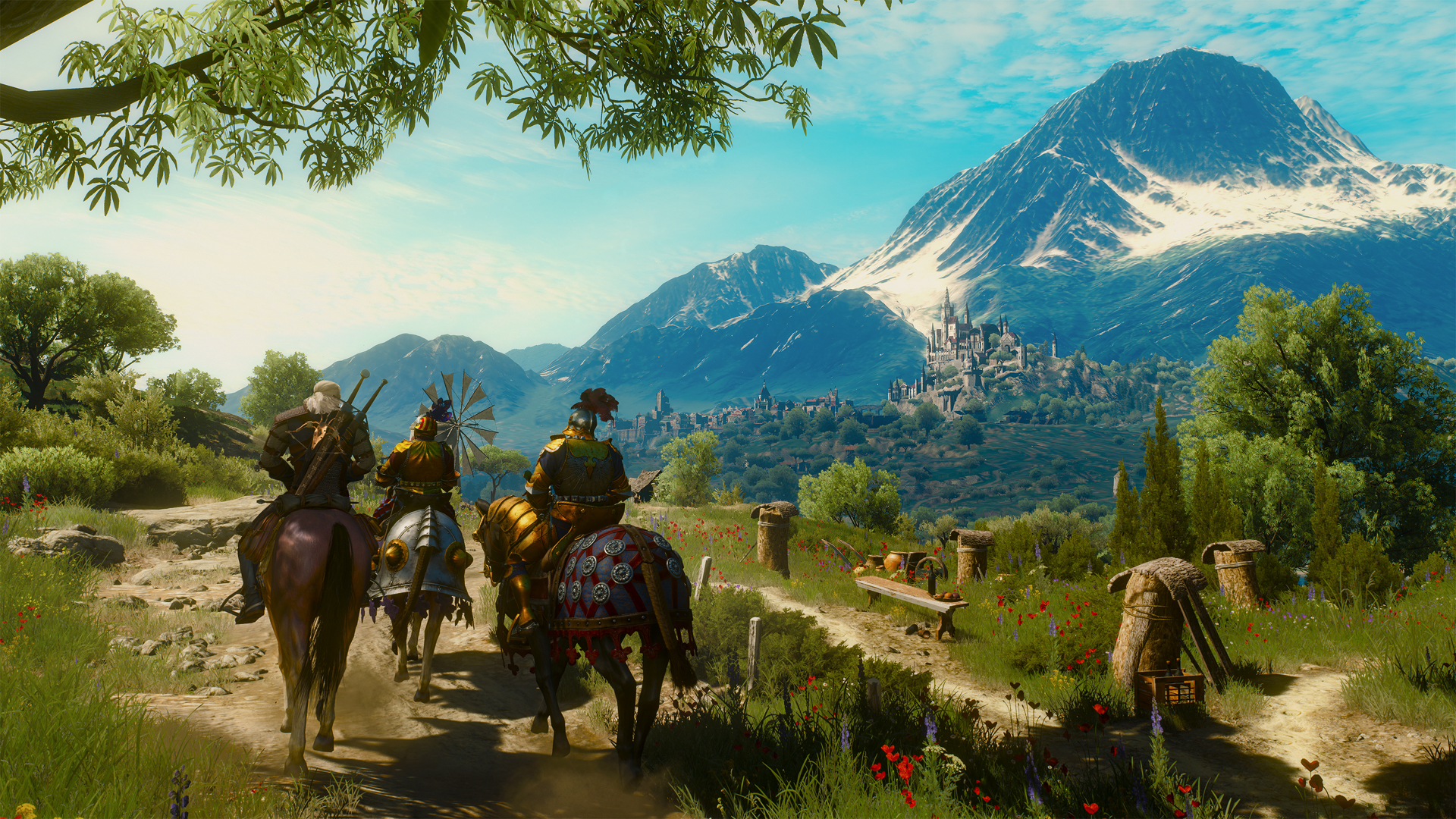 Geralt and companions riding along a mountain path
